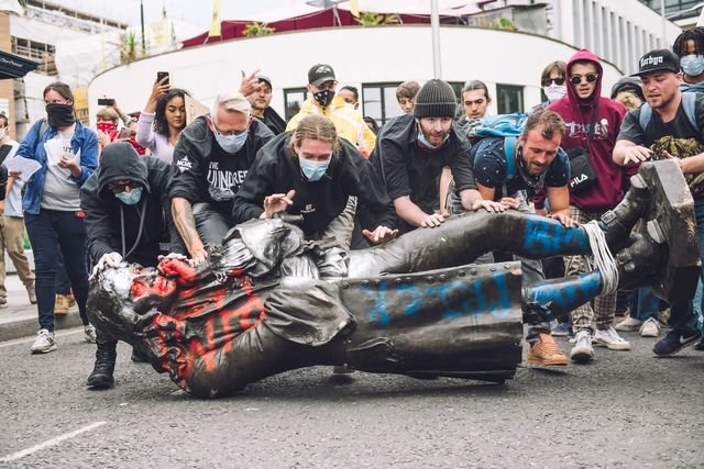 protesters transporting the statue of colston towards the river avon edward colston was a slave trader of the late 17th century who played a major role in the development of the city of bristol, england, on june 7, 2020 photo by giulia spadaforanurphoto via getty images
