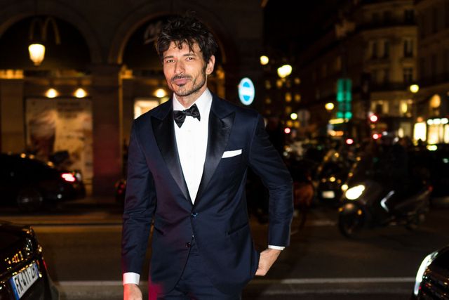 paris, france   february 26 editorial use only andres velencoso segura wears a white shirt, a bow tie, a navy blue blazer jacket, suit pants, outside the harpers bazaar exhibition as part of the paris fashion week womenswear fallwinter 20202021 at musee des arts decoratifs on february 26, 2020 in paris, france photo by edward berthelotgc images