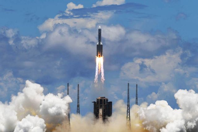 topshot   a long march 5 rocket, carrying an orbiter, lander and rover as part of the tianwen 1 mission to mars, lifts off from the wenchang space launch centre in southern china's hainan province on july 23, 2020 photo by noel celis  afp photo by noel celisafp via getty images
