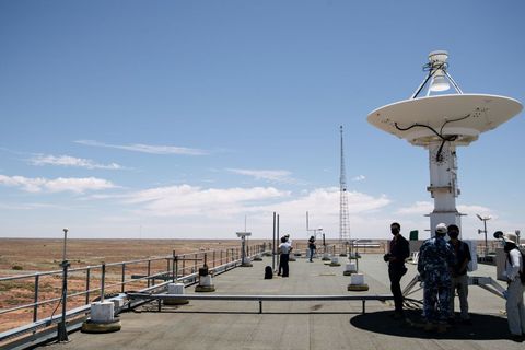 members of the media alongside representatives of the japan aerospace exploration agency jaxa tour the roof of the royal australian air forces raaf woomera range complex in woomera in south australia on december 4, 2020, ahead of jaxas hayabusa 2 probes expected sample drop to earth after landing on and gathering material from an asteroid some 300 million kilometres from earth photo by morgan sette  afp photo by morgan setteafp via getty images