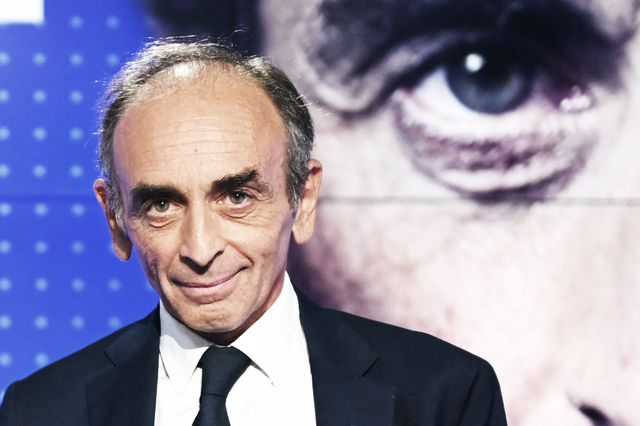 french far right media pundit eric zemmour poses on the set prior to taking part in a televised debate with the leader of french leftist movement la france insoumise lfi and presidential candidate jean luc melenchon, at the studios of french 24h news channel bfmtv in paris on september 23, 2021, ahead of france's 2022 presidential election photo by bertrand guay  pool  afp photo by bertrand guaypoolafp via getty images