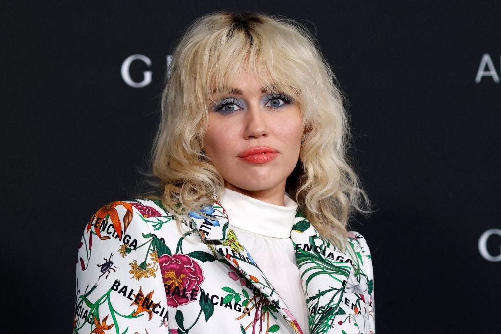 Miley Cyrus Upgraded Her Mullet With Jet Black Skunk Stripes