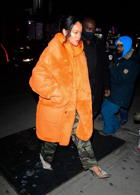See Rihanna Pair a Bright-Orange Coat with Camo Pants