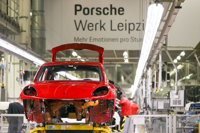 02 february 2022, saxony, leipzig a porsche macan leaves the interior line at the porsche plant in leipzig the automaker will begin series production of the e version of its successful macan model in leipzig in 2023 in 2021, more than 88,000 macans with internal combustion engines had been delivered to customers, it said the conversion and expansion of the leipzig plant is currently underway to prepare it for electromobility around 600 million euros are being invested, including in a new body shop and a dedicated axle production facility porsche is pursuing the goal of having all drive types come off the same production line the leipzig site is celebrating its 20th anniversary this year photo jan woitasdpa zentralbildzb photo by jan woitaspicture alliance via getty images