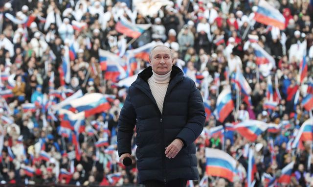 topshot   russian president vladimir putin attends a concert marking the eighth anniversary of russia's annexation of crimea at the luzhniki stadium in moscow on march 18, 2022 photo by mikhail klimentyev  sputnik  afp photo by mikhail klimentyevsputnikafp via getty images