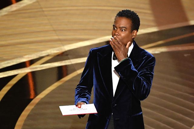 topshot   us actor chris rock speaks onstage during the 94th oscars at the dolby theatre in hollywood, california on march 27, 2022 photo by robyn beck  afp photo by robyn beckafp via getty images
