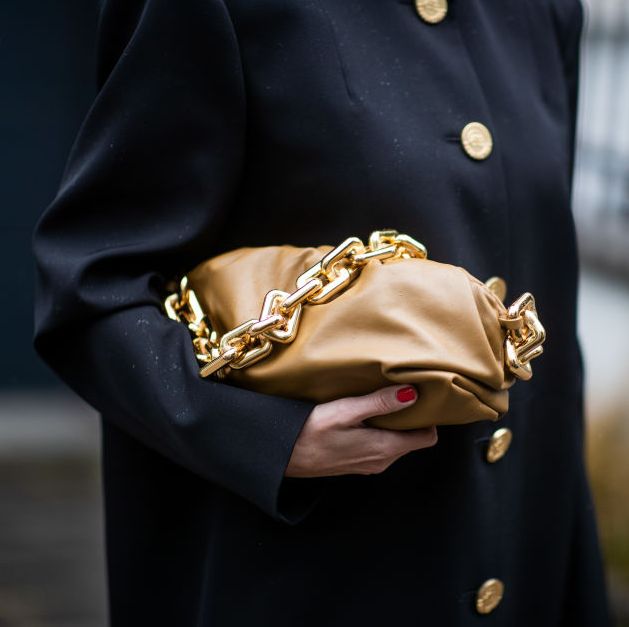 dusseldorf, germany   june 09 alexandra lapp is seen wearing a black balenciaga oversized dress worn as a coat with big shoulder pads and golden buttons, brown bottega veneta the chain pouch on june 09, 2020 in dusseldorf, germany photo by christian vieriggetty images
