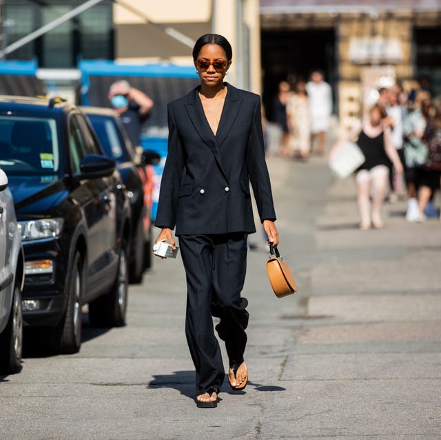 Street Style - Day 3 - Copenhagen Fashion Week Spring/Summer 2021 copenhagen, denmark august 11 a guest wearing black suit is seen outside samsøe samsøe during copenhagen fashion week springsummer 2021 on august 11, 2020 in copenhagen, denmark photo by christian vieriggetty images