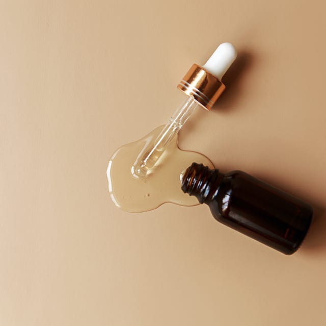Liquid gel or serum texture with glass Pipette on hell background beauty concept liquid gel or serum texture with glass pipette on hell background beauty concept