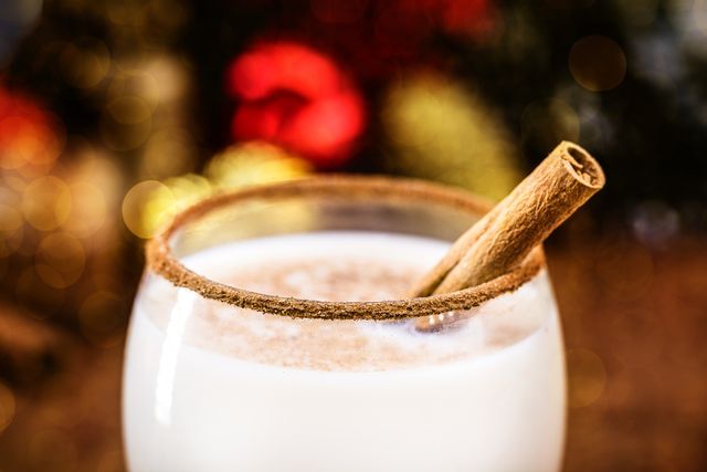 cinnamon used as a glass rim decoration, winter drink, spot focus