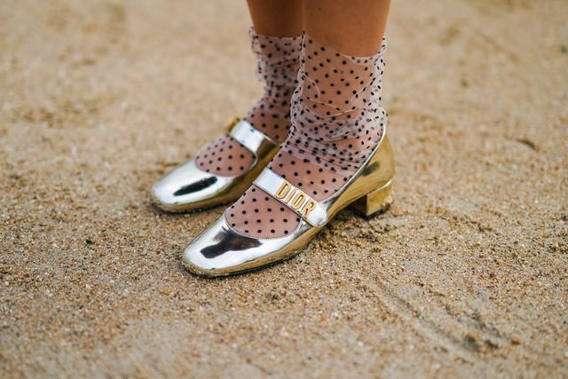paris, france   september 29 gabriella berdugo wears mesh socks with printed polka dots, silver dior ballerina shoes, outside dior, during paris fashion week   womenswear spring summer 2021 on september 29, 2020 in paris, france photo by edward berthelotgetty images