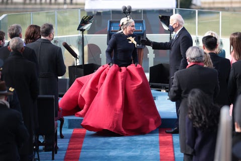 Joe Biden Sworn In As 46th President Of The United States At U.S. Capitol Inauguration Ceremony washington, dc january 20 lady gaga talks with us president elect joe biden during the inauguration of us president elect joe biden on the west front of the us capitol on january 20, 2021 in washington, dc during todays inauguration ceremony joe biden becomes the 46th president of the united states photo by win mcnameegetty images