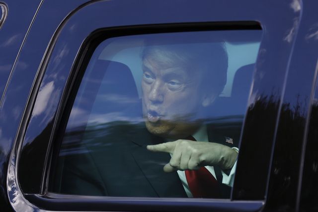 west palm beach, florida   january 20 outgoing us president donald trump waves to supporters lined along on the route to his mar a lago estate on january 20, 2021 in west palm beach, florida trump, the first president in more than 150 years to refuse to attend his successors inauguration, is expected to spend the final minutes of his presidency at his mar a lago estate in florida photo by michael reavesgetty images