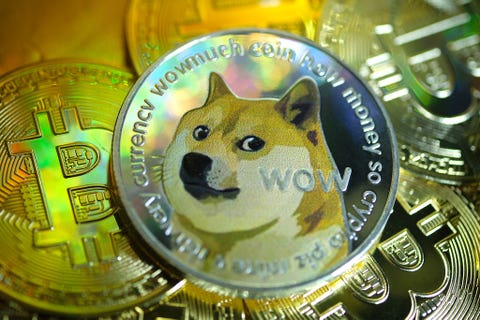 katwijk, netherlands january 29 in this photo illustration, visual representations of digital cryptocurrencies, dogecoin and bitcoin are arranged on january 29, 2021 in katwijk, netherlands photo by yuriko nakaogetty images