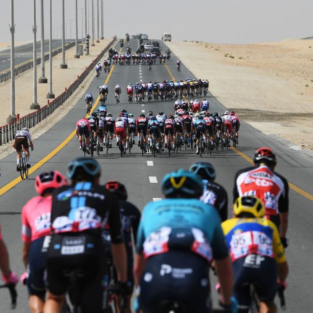 abu dhabi, united arab emirates   february 21 the peloton riding in echelons formation due crosswind during the 3rd uae tour 2021, stage 1 a 176km stage from al dhafra castle to al mirfa  desert  landscape  uaetour  on february 21, 2021 in abu dhabi, united arab emirates photo by tim de waelegetty images