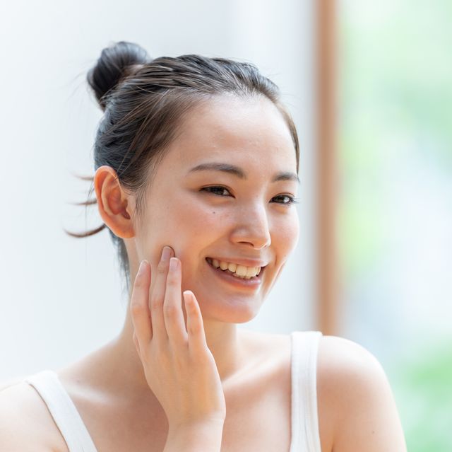 attractive japanese woman skin care image