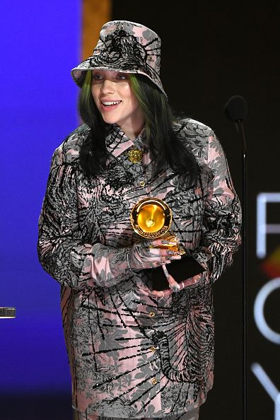 los angeles, california   march 14 billie eilish accepts the record of the year award for everything i wanted onstage during the 63rd annual grammy awards at los angeles convention center on march 14, 2021 in los angeles, california photo by kevin wintergetty images for the recording academy