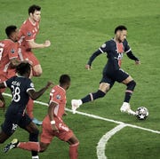 Paris Saint-Germain v FC Bayern Munich - UEFA Champions League Quarter Final 3: Leg Two paris, france april 13 neymar jr of paris saint germain in action with benjamin pavard of fc bayern munich during the uefa champions league quarter final second leg match between paris saint germain and fc bayern munich at parc des princes on april 13, 2021 in paris, france photo by xavier lainegetty images