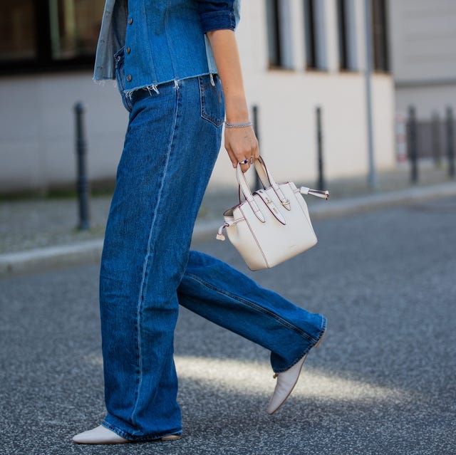 berlin, germany   june 02 jacqueline zelwis is seen wearing 7 for all mankind x marques almeida denim jacket, white cropped top
zara, levis jeans, agl shoes, furla bag on june 02, 2021 in berlin, germany photo by christian vieriggetty images