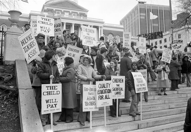 teachers hold signs and march together during a strike protesting for better working conditions, boston, 1969 photo by spencer grantgetty images