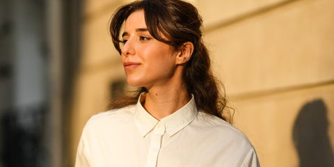 Fashion Photo Session In Paris - August 2021 paris, france august 28 ketevan giorgadze katieone wears a white waist tie shirt from le ger, ocean blue high waist cropped wide leg trousers pants from the frankie shop, a gold circle chain belt, on august 28, 2021 in paris, france photo by edward berthelotgetty images