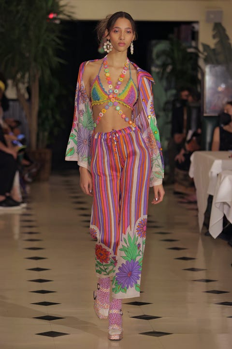 new york, new york september 11 a model walks the runway at the anna sui spring summer 2022 fashion show during nyfw the shows at indochine on september 11, 2021 in new york city photo by randy brookewireimage