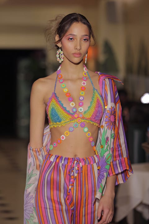 new york, new york september 11 a model walks the runway at the anna sui spring summer 2022 fashion show during nyfw the shows at indochine on september 11, 2021 in new york city photo by randy brookewireimage