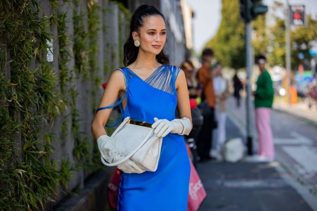 milan, italy   september 24 anna rosa vitiello seen wearing blue dress, white bag, heels outside sportmax during the milan fashion week   spring  summer 2022 on september 24, 2021 in milan, italy photo by christian vieriggetty images