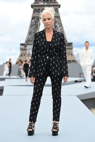 Dame Helen Mirren Leads The Models At Paris Fashion Week Show