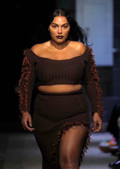 NEW YORK, NY - FEBRUARY 12 A model walks the runway in Eckhaus Lattafall fashion during New York Fashion Week at Old Essex Street Market on February 12, 2022 in New York City.