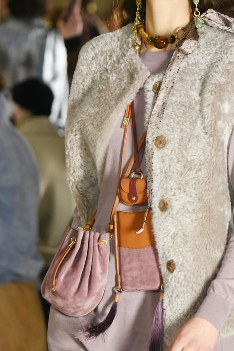 new york, new york   february 13 a model, handbag detail, walks the runway at the ulla johnson show during new york fashion week the shows fallwinter 2022 at the new york library on february 13, 2022 in new york city photo by albert ursogetty images