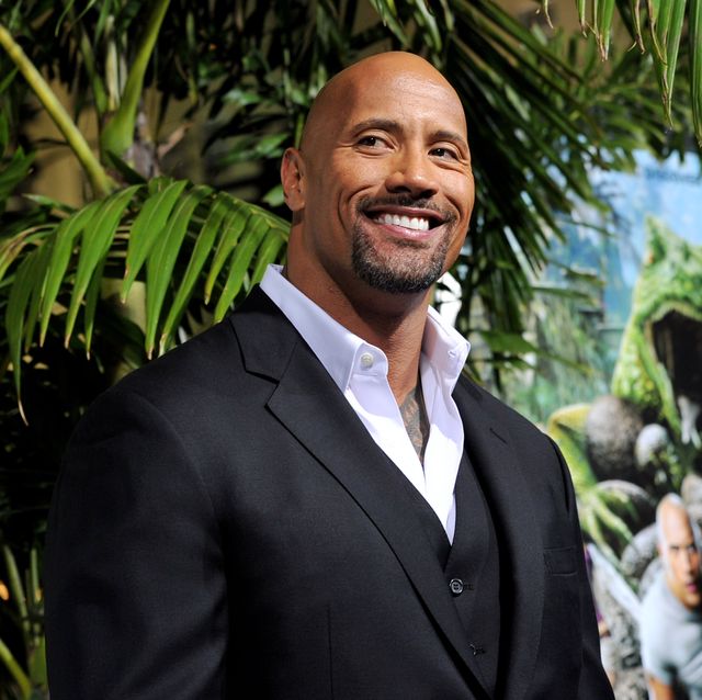 los angeles, ca   february 02  actor dwayne johnson arrives at the premiere of warner bros pictures journey 2 the mysterious island at the chinese theater on february 2, 2012 in los angeles, california  photo by kevin wintergetty images