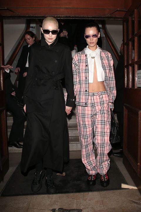 london, england   march 11 gigi hadid and bella hadid seen leaving central hall westminster after walking the burberry aw 2023 womenswear collection presentation  on march 11, 2022 in london, england photo by neil mockford  ricky vigil mgc images