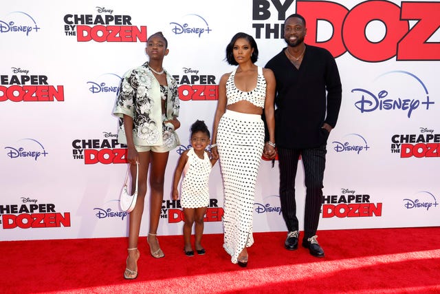 los angeles, california march 16 l r zaya wade, kaavia james union wade, gabrielle union, and dwyane wade attend the premiere of disney's "cheaper by the dozen" on march 16, 2022 in los angeles, california photo by frazer harrisonwireimage