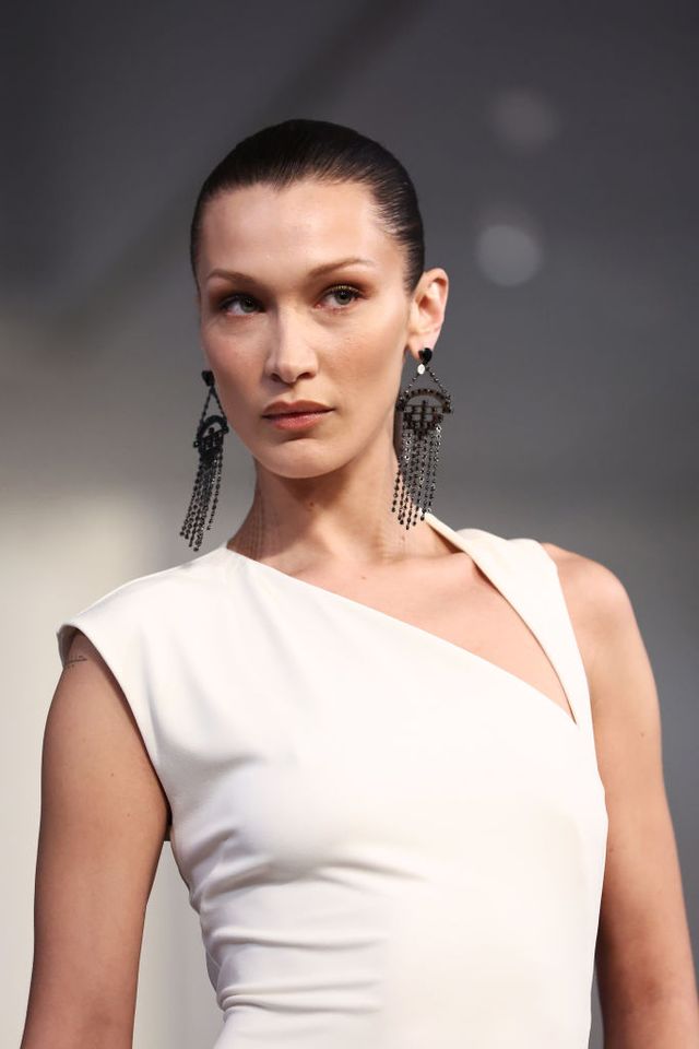 new york, new york   march 22 bella hadid, jewelry detail, walks the runway at the ralph lauren fall 2022 fashion show at the museum of modern art on march 22, 2022 in new york city photo by arturo holmesgetty images