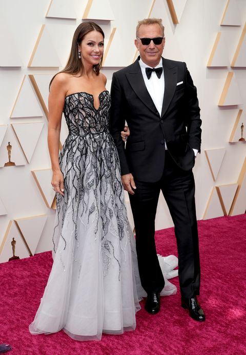 hollywood, california   march 27 l r christine baumgartner and kevin costner attend the 94th annual academy awards at hollywood and highland on march 27, 2022 in hollywood, california photo by kevin mazurwireimage