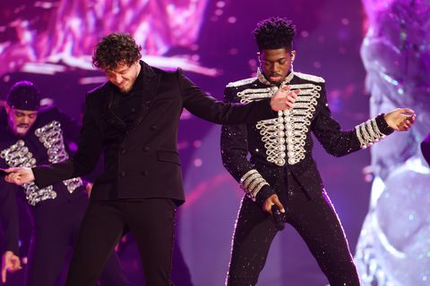 las vegas, nevada april 03 lr jack harlow and lil nas x perform onstage during the 64th annual grammy awards at mgm grand garden arena on april 03, 2022 in las vegas, nevada photo by rich furygetty images for the academy of d 'registration