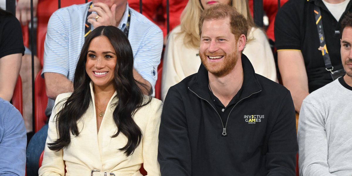 Meghan Markle Wears a White Belted Jacket and Pumps to Invictus Games
