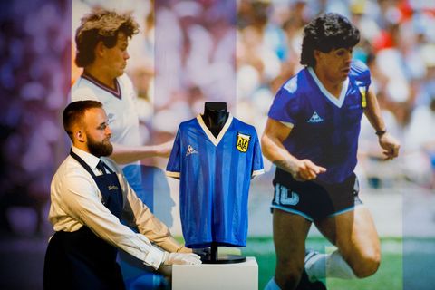 london, england   april 20 sotheby’s new bond street exhibition of diego maradona’s historic 1986 world cup match worn shirt opens to the public at sothebys on april 20, 2022 in london, england the shirt was worn both during ‘the hand of god’ and ‘goal of the century’ goals, as shown by resolution photomatching the online auction opened this morning, with a first bid now placed on the lot for £4 million, bidding remains open until 4 may photo by tristan fewingsgetty images for sothebys