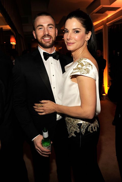 west hollywood, ca february 26 exclusive access special rates do not apply north american on-air broadcast until march 1, 2012 chris evans and sandra bullock attend vanity fair oscar party 2012 hosted by graydon carter at sunset tower on Feb 26, 2012 in West Hollywood, California Photo by Kevin Mazurvf12wireimage