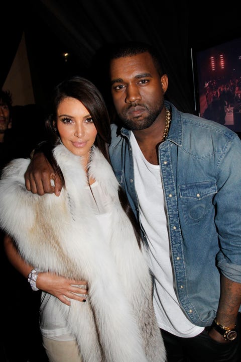 paris, france   march 06 kim kardashian and kanye west attend the kanye west  ready to wear fallwinter 2012 show as part of paris fashion week at halle freyssinet on march 6, 2012 in paris, france photo by michel dufourwireimage