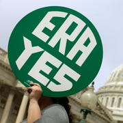 Rally At U.S. Capitol Celebrates 40th Anniversary Of Congressional Passage Of ERA washington, dc march 22 a woman hold up a sign as members of congress and representatives of womens groups hold a rally to mark the 40th anniversary of congressional passage of the equal rights amendment era outside the us capitol march 22, 2012 in washington, dc rep carolyn maloney d ny and sen robert menendez d nj introduced a new version of the equal rights amendment last year and called for it to be passed again photo by chip somodevillagetty images