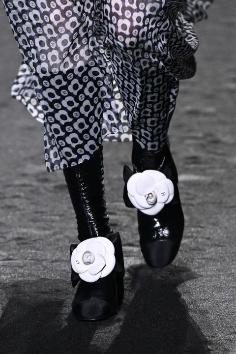 paris, france march 07 editorial use only for non editorial use please seek approval from fashion house a model shoes detail walks the runway during the chanel womenswear fall winter 2023 2024 show as part of paris fashion week on march 07, 2023 in paris, france photo by stephane cardinale corbiscorbis via getty images