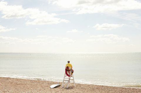Lifeguard looking out to sea