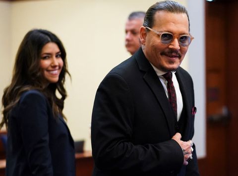 actor johnny depp arrives in the courtroom at the fairfax county circuit courthouse during a defamation trial against ex wife amber heard, in fairfax, virginia, on may 18, 2022 actor johnny depp is suing ex wife amber heard for libel after she wrote an op ed piece in the washington post in 2018 referring to herself as a public figure representing domestic abuse photo by kevin lamarque pool afp photo by kevin lamarque pool afp via getty images