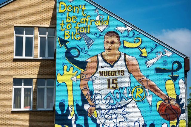 this photo taken on june 25, 2019 shows a mural depicting nikola jokic, the 24 year old serbian basketball player who plays for the nba's denver nuggets, painted on a wall of his former school in his hometown of sombor   serbs are hoping that their homegrown hero jokic    who did not play in the 2014 world cup    can fire the country at the latest edition, which starts on august 31 in china beaten in the final last time, serbia are again among the favourites to challenge holders the united states photo by andrej isakovic  afp  to go with basket wc 2019 chn srb jokic,profile by jovan matic        photo credit should read andrej isakovicafp via getty images