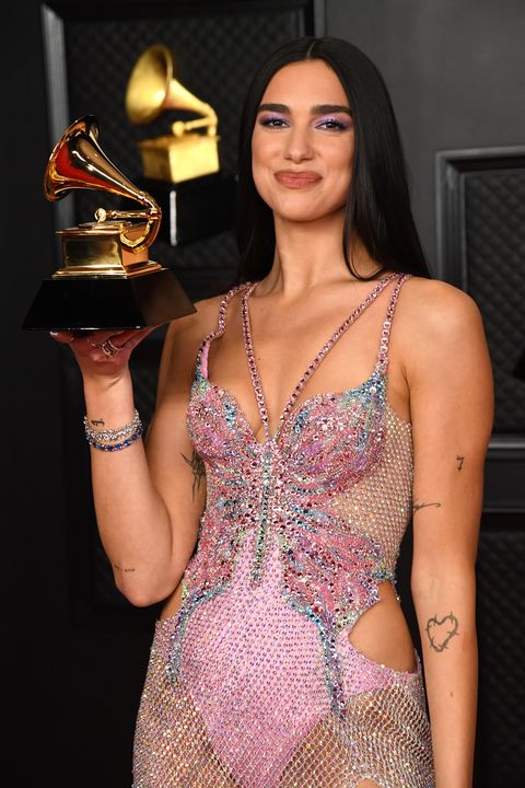 los angeles, california march 14 dua lipa, winner of best pop vocal album for 'future nostalgia', poses in the media room during the 63rd annual grammy awards at the los angeles convention center on march 14, 2021 in los angeles , california photo by kevin mazurgetty images for the recording academy