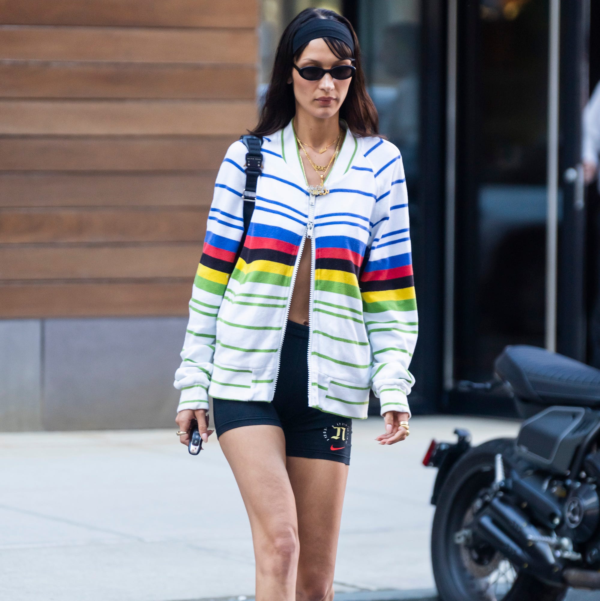 Bella Hadid Pairs Her Biker Shorts With an Unzipped Top