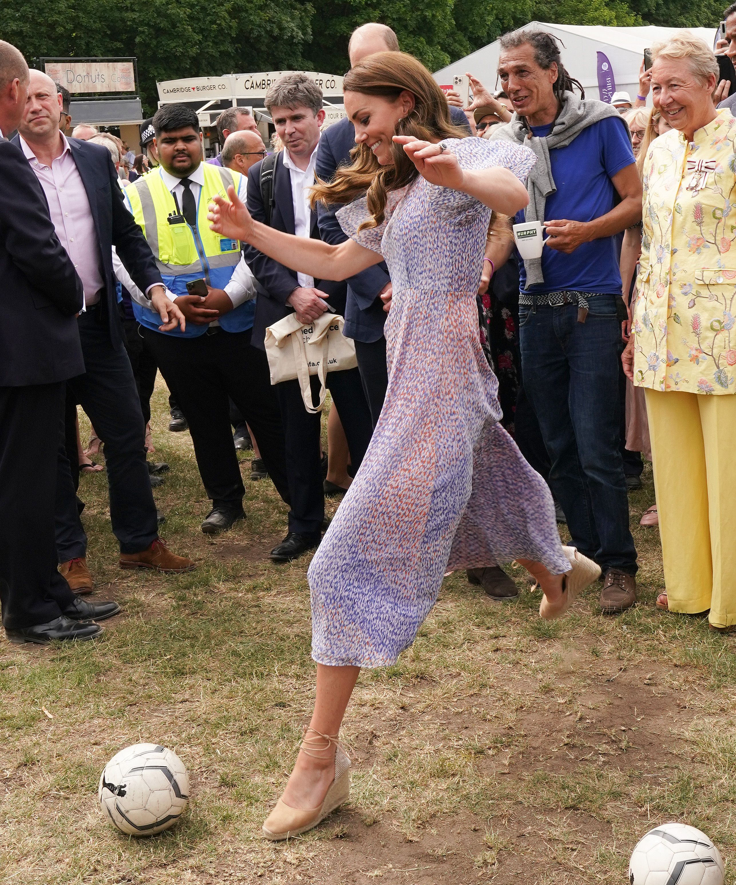 Here's Kate Middleton Kicking a Soccer Ball in Heels Like a Pro