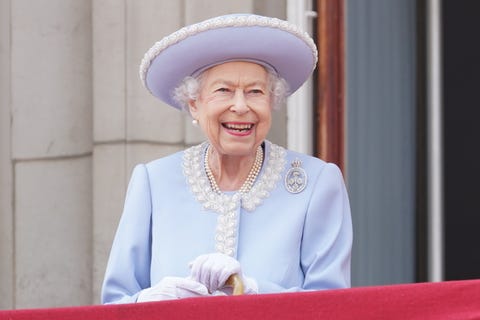 london, england   june 02 queen elizabeth ii watches from the balcony of buckingham palace during the trooping the colour parade the trooping the colour parade on june 2, 2022 in london, england trooping the colour, also known as the queens birthday parade, is a military ceremony performed by regiments of the british army that has taken place since the mid 17th century it marks the official birthday of the british sovereign this year, from june 2 to june 5, 2022, there is the added celebration of the platinum jubilee of elizabeth ii  in the uk and commonwealth to mark the 70th anniversary of her accession to the throne on 6 february 1952 photo by jonathan brady   wpa poolgetty images